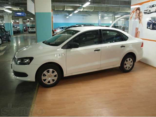 Volkswagen Polo, белый седан 2013 года выпуска в городе Москва, фото 5, Московская область