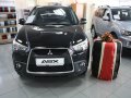 Mitsubishi ASX,  внедорожник,  2012 г. в.,  автомат,  1,798 л,  цвет:  черный металлик в городе Москва, фото 1, Московская область