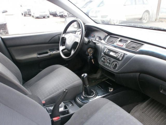 Mitsubishi Lancer 2004г.  механика 1584см.  куб в городе Пермь, фото 5, Пермский край