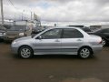 Mitsubishi Lancer 2004г.  механика 1584см.  куб в городе Пермь, фото 1, Пермский край