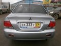 Mitsubishi Lancer 2004г.  механика 1584см.  куб в городе Пермь, фото 4, Пермский край