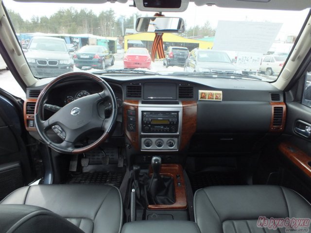 Nissan Patrol,  внедорожник,  2009 г. в.,  пробег:  24000 км.,  механическая,  3 л в городе Сургут, фото 3, стоимость: 1 500 000 руб.