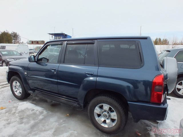 Nissan Patrol,  внедорожник,  2009 г. в.,  пробег:  24000 км.,  механическая,  3 л в городе Сургут, фото 5, Ханты-Мансийский автономный округ