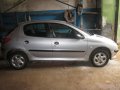 Peugeot 206,  хэтчбек,  2001 г. в.,  пробег:  128000 км.,  автоматическая,  1.4 л в городе Кострома, фото 1, Костромская область