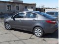 KIA Rio,  седан,  2012 г. в.,  пробег:  13500 км.,  механическая,  1,4 л в городе Новотроицк, фото 1, Оренбургская область