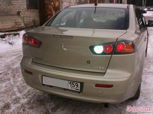 Mitsubishi Lancer,  седан,  2011 г. в.,  пробег:  30000 км.,  механическая,  1.5 л в городе Пермь, фото 4, стоимость: 580 000 руб.