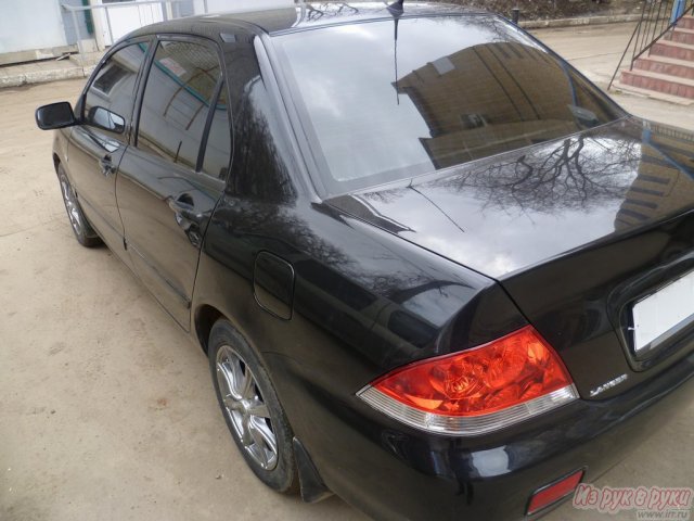 Mitsubishi Lancer,  седан,  2006 г. в.,  пробег:  126000 км.,  механическая в городе Киров, фото 5, стоимость: 320 000 руб.