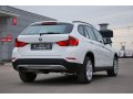 BMW X1 2012г.  автомат 1995см.  куб в городе Москва, фото 1, Московская область