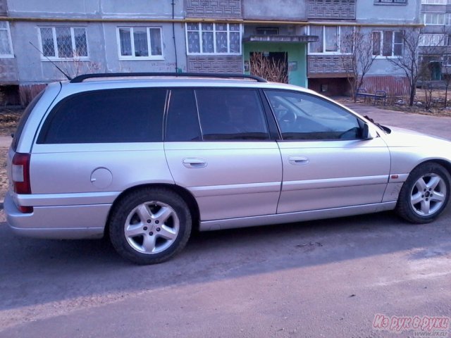 Универсалы 2000. Opel Omega универсал 2000. Opel Omega b 2000 универсал. Опель Омега универсал 2000 год. Опель Омега универсал серебристая 1995 универсал.