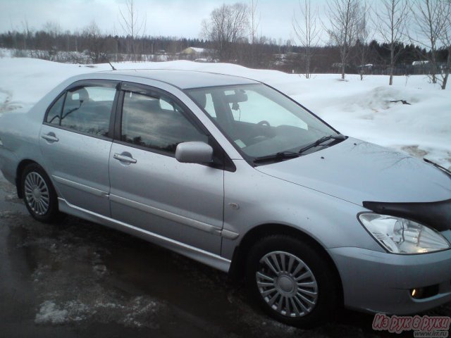 Mitsubishi Lancer,  седан,  2005 г. в.,  пробег:  108000 км.,  механическая,  1.6 л в городе Мирный, фото 3, Архангельская область