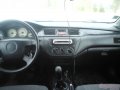 Mitsubishi Lancer,  седан,  2005 г. в.,  пробег:  108000 км.,  механическая,  1.6 л в городе Мирный, фото 4, Архангельская область