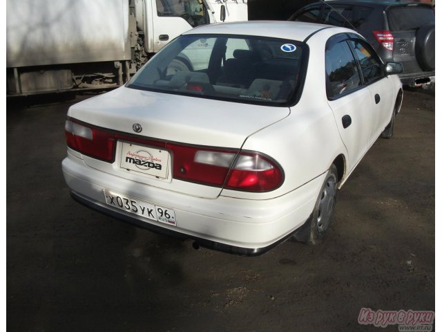 Mazda Familia,  седан,  1997 г. в.,  автоматическая,  1.5 л в городе Екатеринбург, фото 4, стоимость: 160 000 руб.