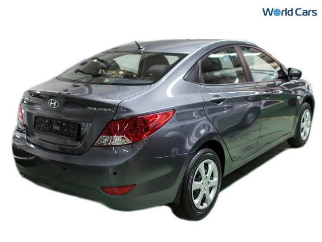 Hyundai Solaris,  седан,  2013 г. в.,  автомат,  1,4 л,  цвет:  серый в городе Москва, фото 4, стоимость: 428 000 руб.