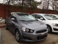 Chevrolet Aveo,  седан,  2013 г. в.,  автомат,  1,598 л,  цвет:  серый в городе Москва, фото 1, Московская область