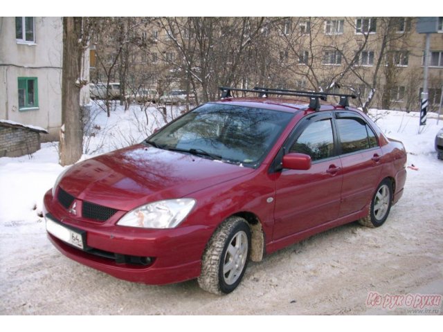 Mitsubishi Lancer,  седан,  2005 г. в.,  пробег:  160000 км.,  механическая,  1596 л в городе Саратов, фото 5, стоимость: 305 000 руб.