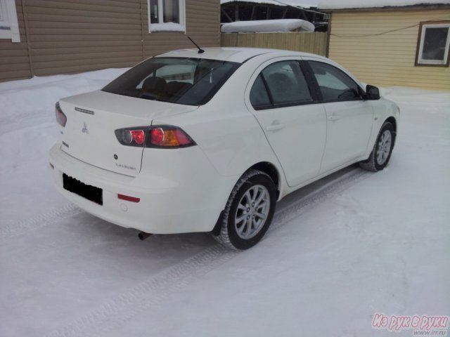 Mitsubishi Lancer,  седан,  2012 г. в.,  пробег:  11000 км.,  механическая,  1.6 л в городе Киров, фото 8, стоимость: 620 000 руб.