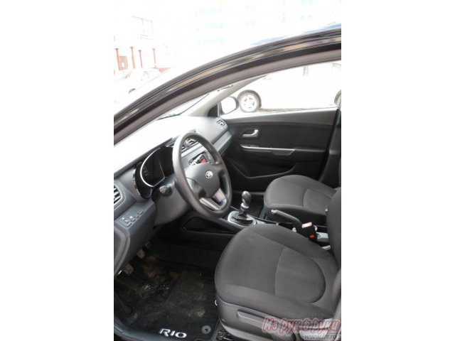 KIA Rio,  седан,  2012 г. в.,  пробег:  27000 км.,  механическая,  1.6 л в городе Новосибирск, фото 6, KIA