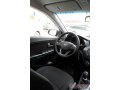 KIA Rio,  седан,  2012 г. в.,  пробег:  27000 км.,  механическая,  1.6 л в городе Новосибирск, фото 4, Новосибирская область