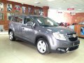 Chevrolet Orlando,  универсал,  2012 г. в.,  автомат,  1,799 л,  цвет:  серый в городе Москва, фото 1, Московская область