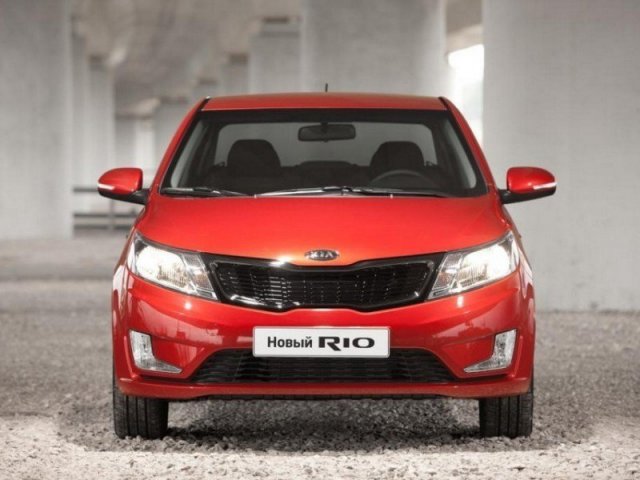 KIA Rio III,  седан,  2012 г. в.,  механика,  1,4 л,  цвет:  красный в городе Москва, фото 1, KIA