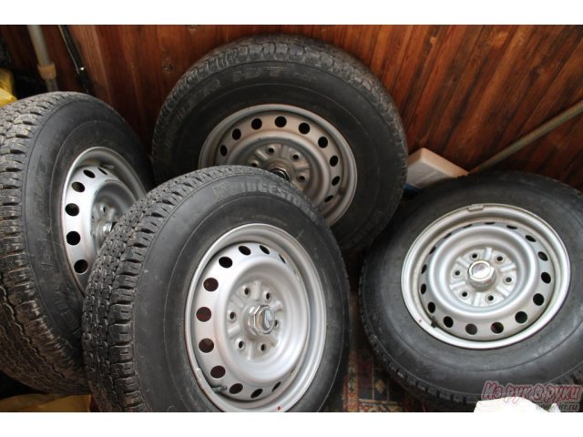 Шины:  205/80 R16 Bridgestone Dueler H/T,  Диски :   PCD:  6*139.7 Dia:  67,1 мм ET:  38,  на Mitsubishi L200 в городе Сургут, фото 1, Колеса