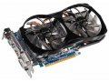 Видеокарта Gigabyte GeForce GTX 650 Ti 1032Mhz PCI-E 3.0 2048Mb 5400Mhz 128 bit 400W VGA 2xDVI HDMI HDCP (GV-N65TOC-2GI) в городе Тюмень, фото 1, Тюменская область